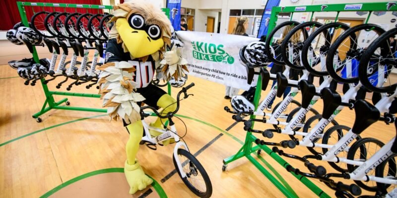 Falcons Surprise Atlanta Kindergarteners with the Gift of Confidence on Two Wheels